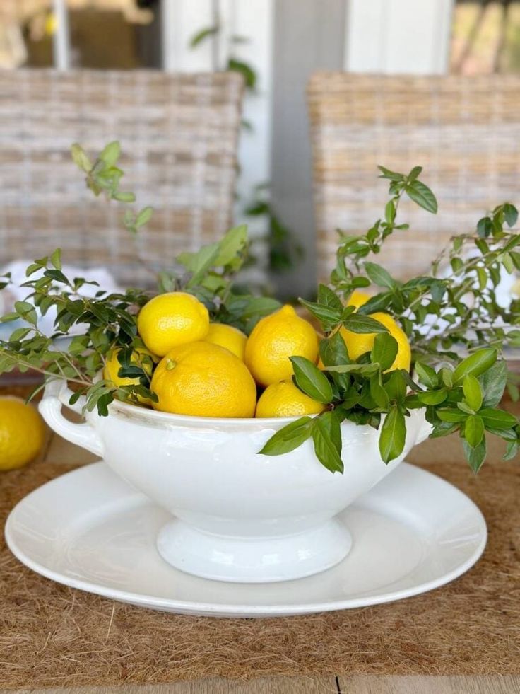Citrus-bowl-with-lemons-and-greenery