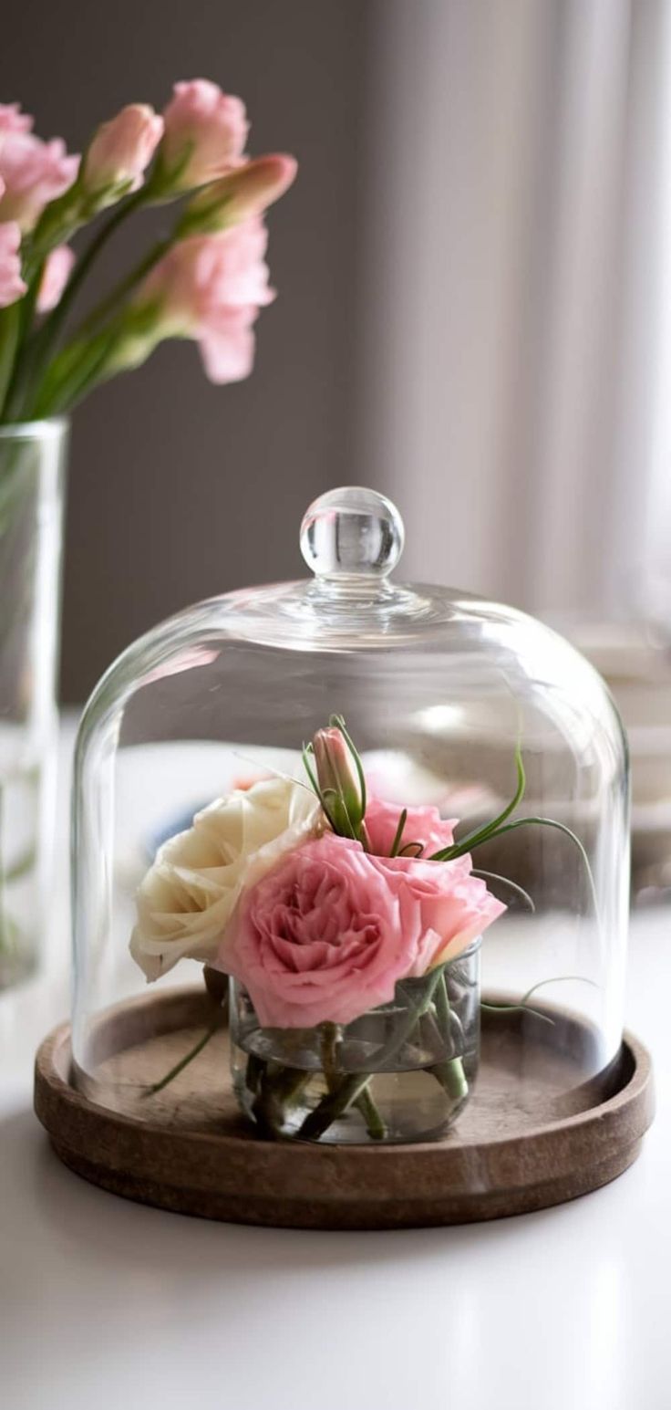 Glass-cloche-with-flowers-or-spring-decor