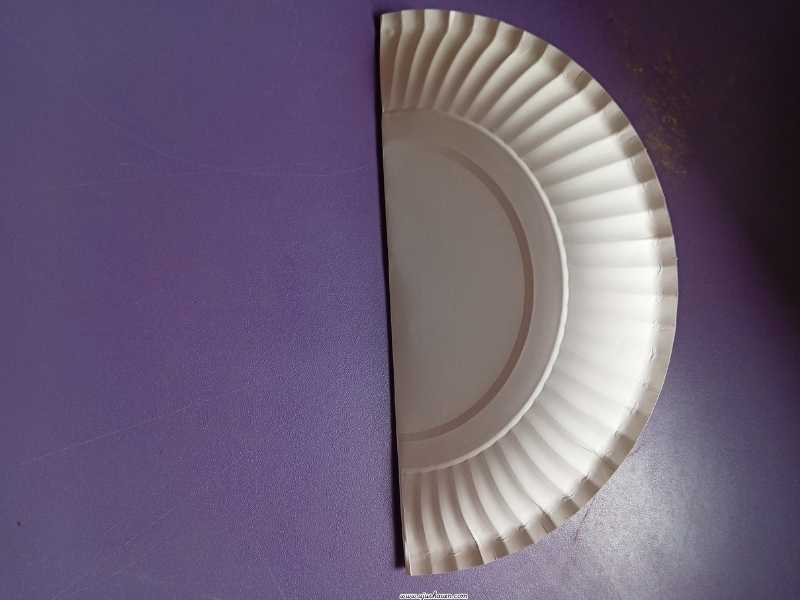 Step-1-Fold-the-Paper-Plate-in-Half-Paper-Plate-Watermelon-Craft-for-Kids