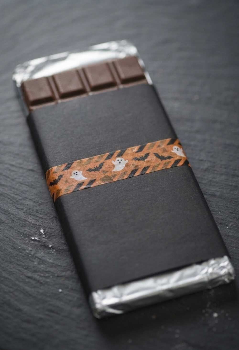 Black-and-Orange-Washi-Tape-Wrap-Halloween-Chocolate-Bar-Ideas.